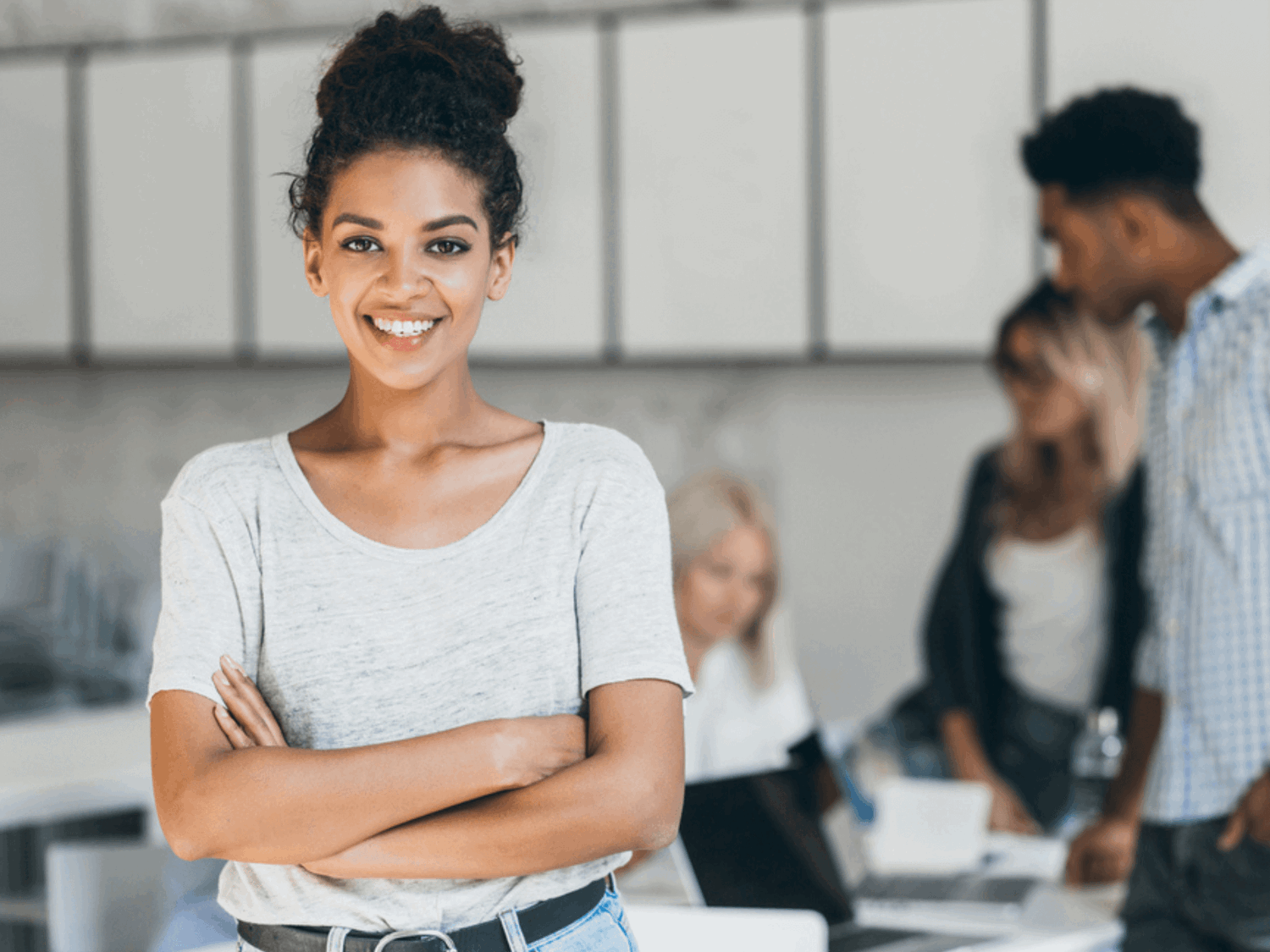 Girl smiling in an office