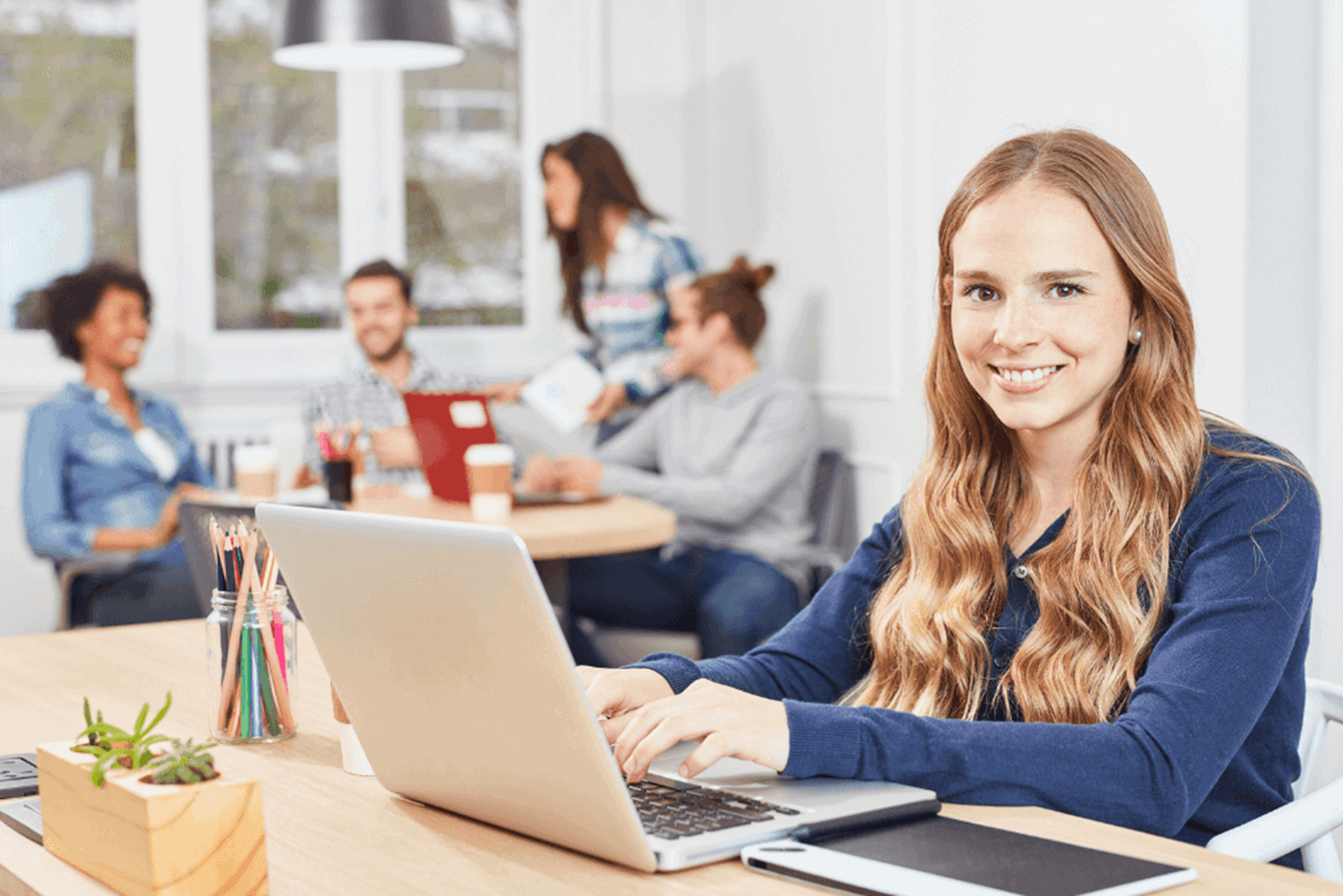 Happy girl in office