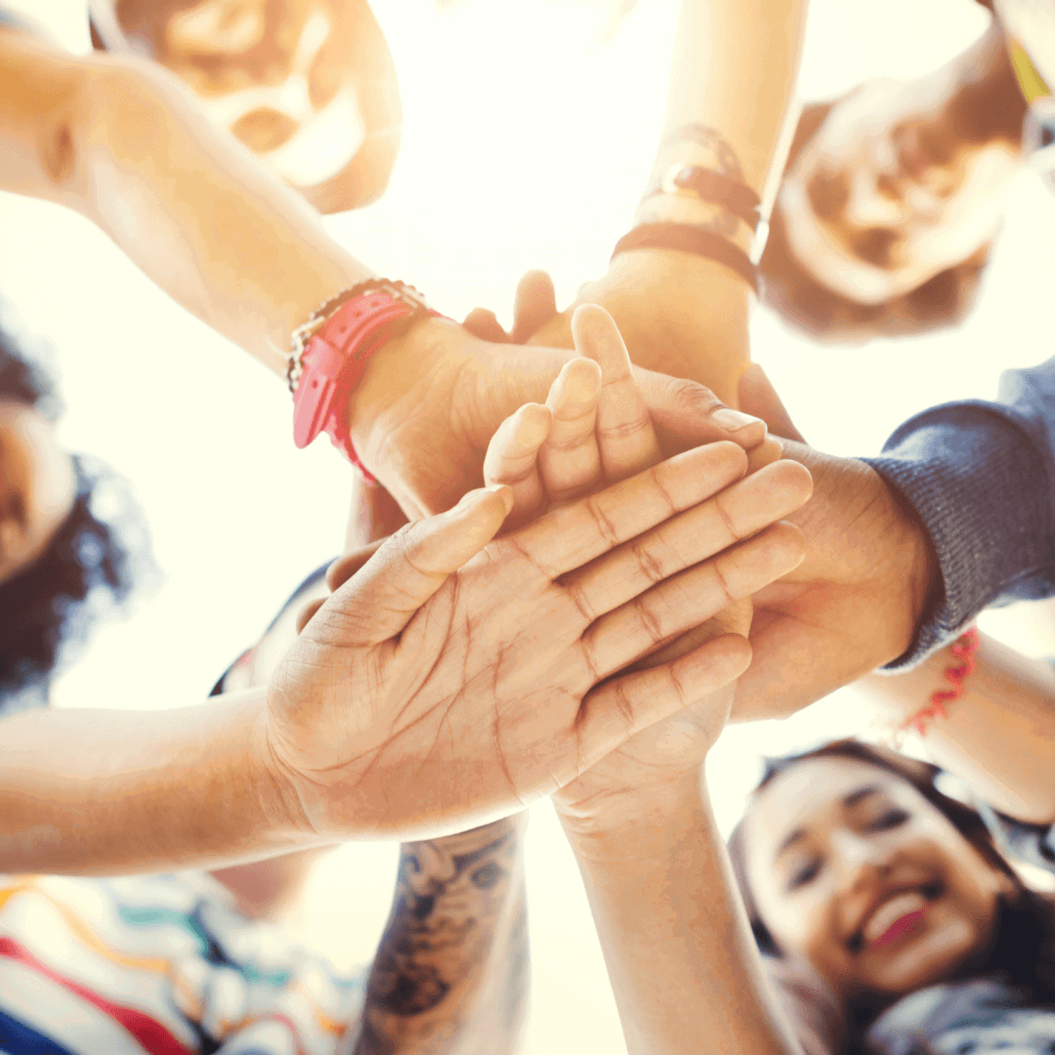 Group of people holding hands